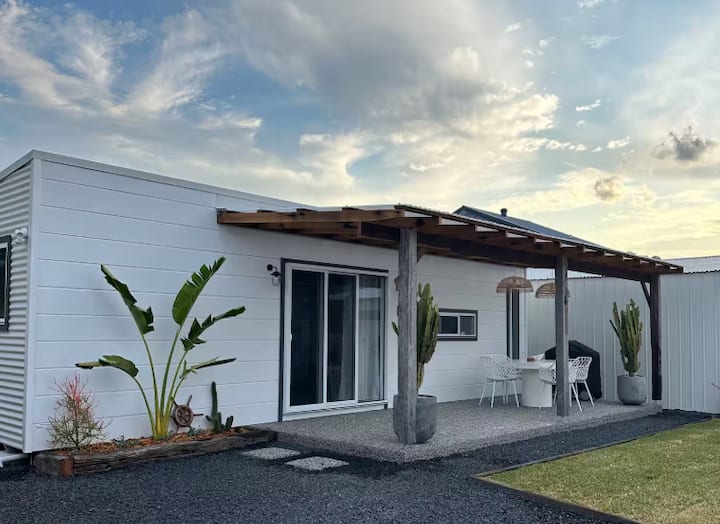 Modern white house with covered patio