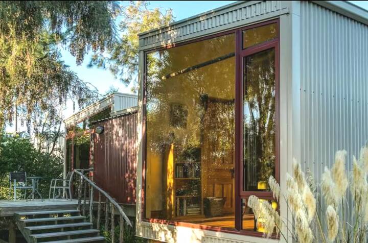 Modern cabin with large amber-tinted window