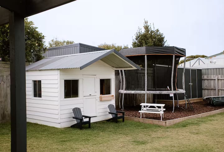 Cubby house and trampoline