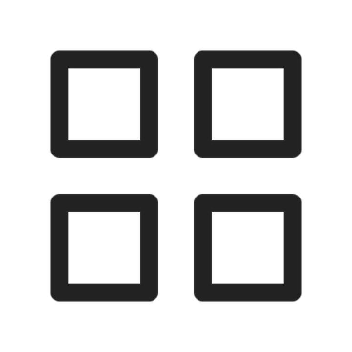 Quatre icônes noires carrées disposées en grille 2x2, représentant les quatre axes clés du style photographique d'Airbnb.