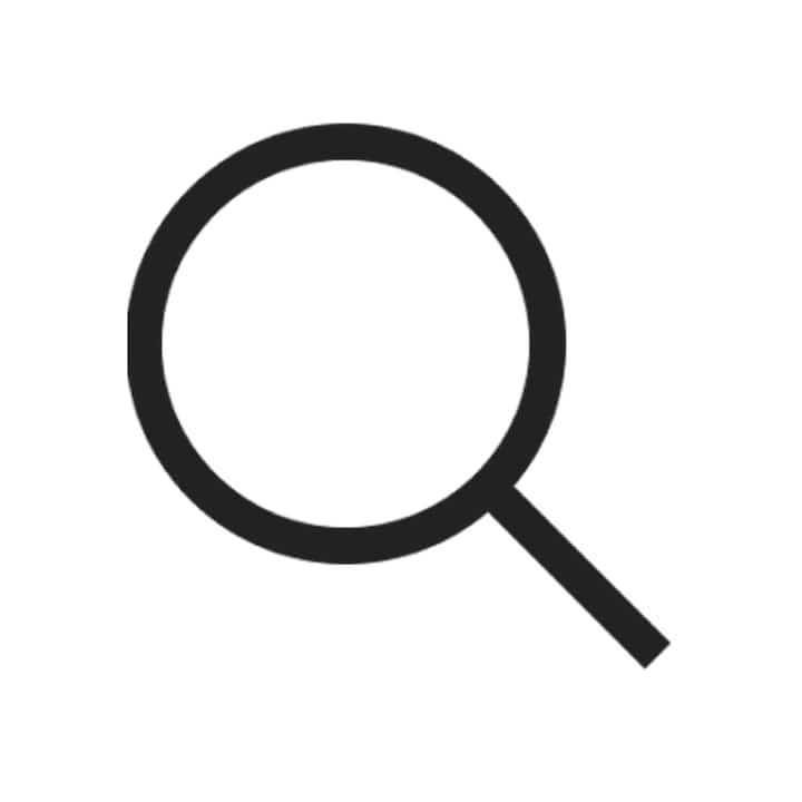 Icône représentant une loupe noire simplifiée, pour illustrer le concept de recherche du détail ou d'attention portée sur un détail.