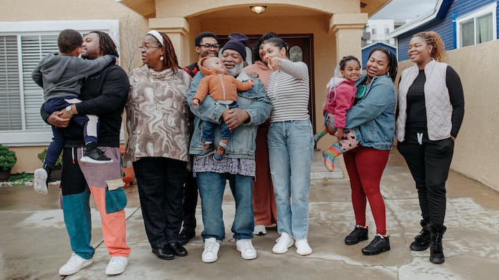 Family standing outside of their airbnb.org stay