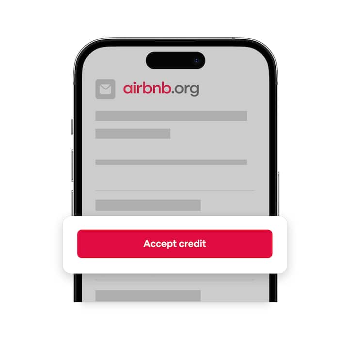 Phone with an email from Airbnb.org and a big red button that says “Accept credit”