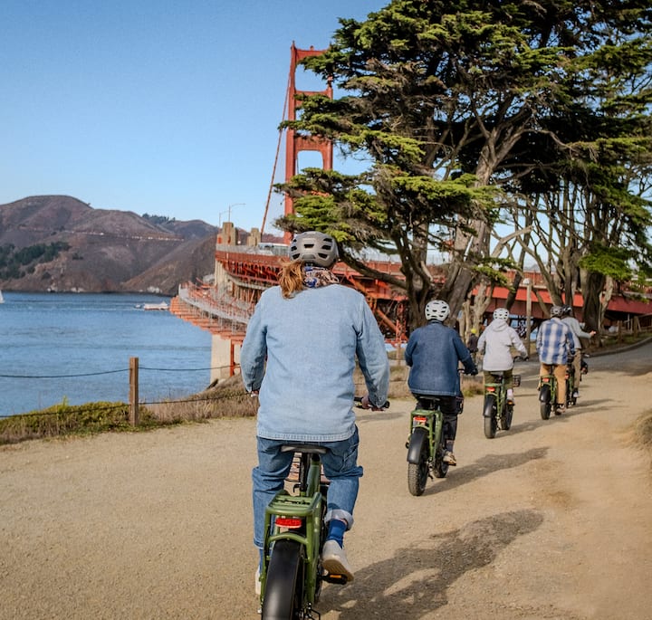 An image of a group biking near the Golden Gate Bridge