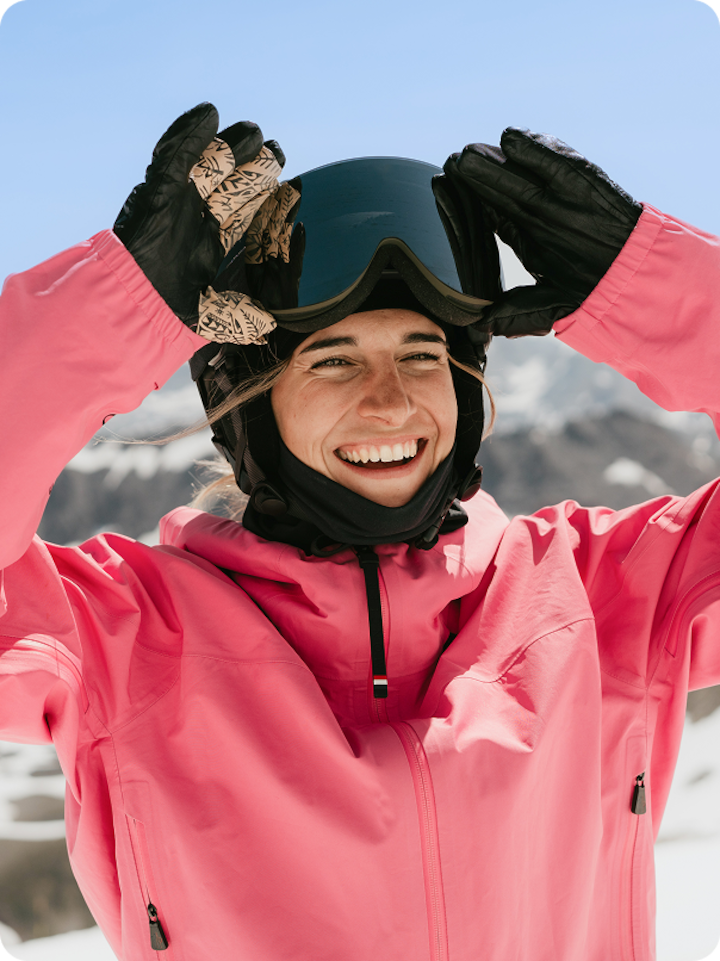 Olympian Perrine Laffont lifting her goggles and smiling broadly