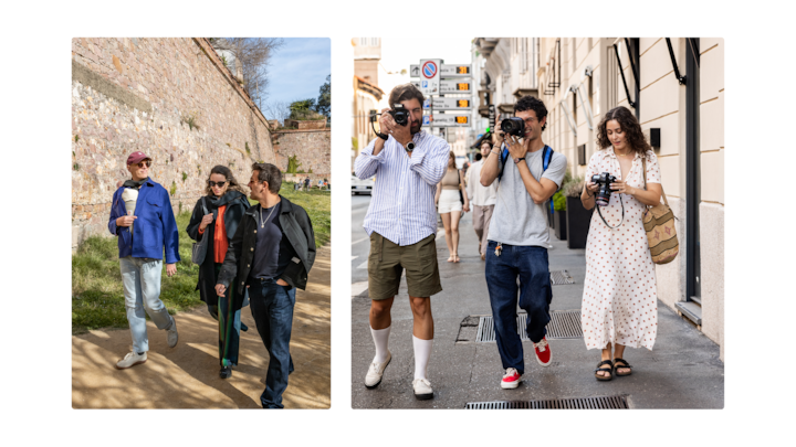 Un groupe de personnes marche le long d'un ancien mur de pierre en extérieur, tout en discutant et en explorant les lieux.