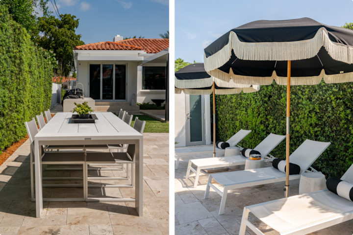 Deux espaces extérieurs : un coin repas avec une table blanche sur une terrasse à côté d'une maison, et un coin détente au bord d'une piscine avec des chaises inclinables sous des parasols noirs, entourés d'une végétation luxuriante.