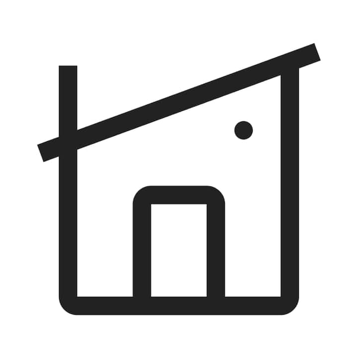 Icône au style minimaliste représentant une maison avec un toit en pente, symbolisant les logements standard dans le cadre du programme de photographie d'Airbnb.