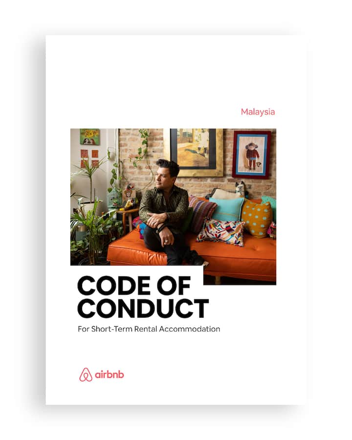 Malaysia Code of Conduct cover: host seated in a cozy living room, highlighting standards for short-term rental accommodation.