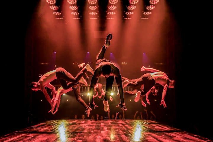 Magic Mike Live cast break dancing on stage
