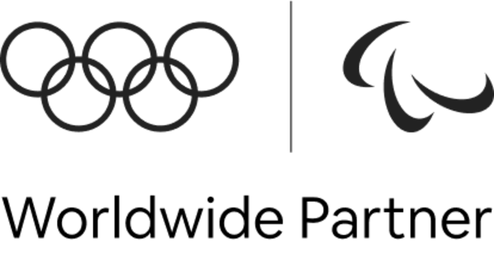 Logos représentant le partenariat mondial entre Airbnb et les Jeux Olympiques organisés aux États-Unis