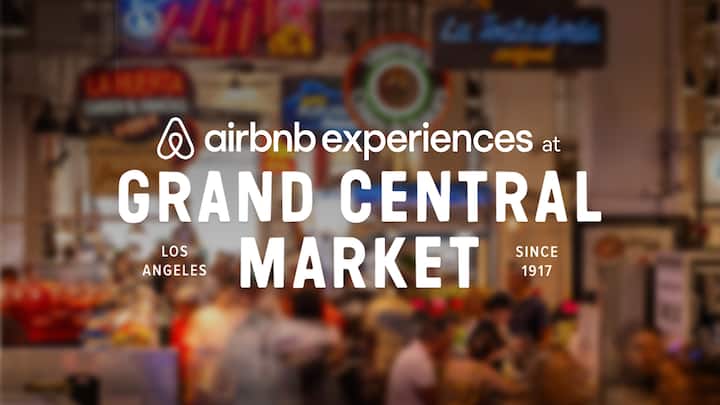 Text over a busy food hall reads: airbnb experiences at Grand Central Market, Los Angeles, since 1917.