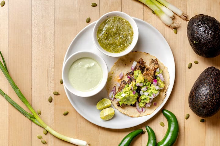 Taco with salsas and fresh ingredients from a Grand Central Market food experience in Downtown Los Angeles