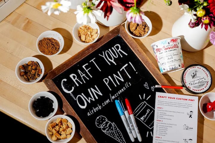 Ice cream mix-in station at Grand Central Market with a chalkboard reading “Craft Your Own Pint.”