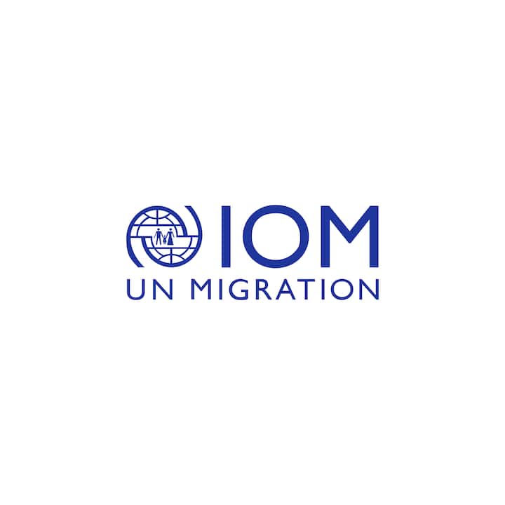 IOM UN Migration logo representing an Airbnb.org Southeast Asia partner