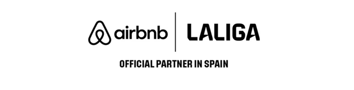 Airbnb and LaLiga logos side by side, separated by a vertical line, with the text ‘OFFICIAL PARTNER IN SPAIN’ below.