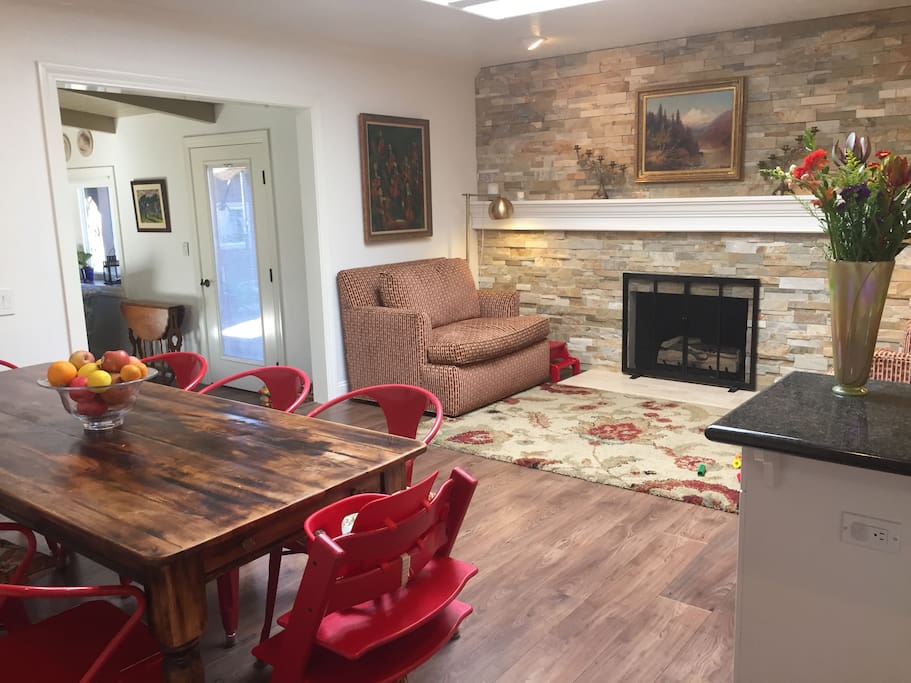 View of the great room, with combined kitchen, dining and seating areas, which also opens onto living room