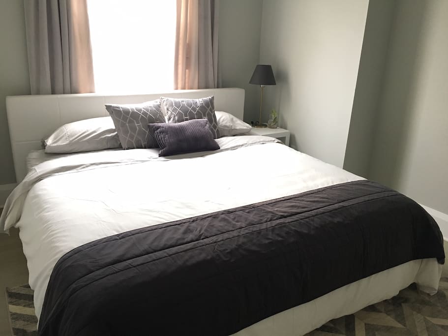 Master Bedroom: King-size bed with desk, TV with all channels and video library, walk-in closet and ensuite bathroom.