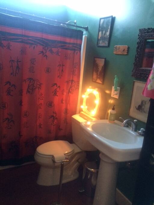Bathroom with tub and shower.