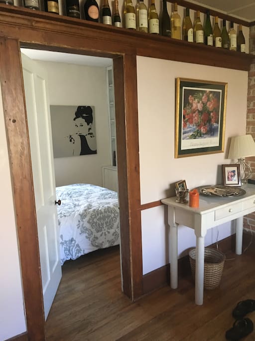 Entrance to bedroom is off of the dining room