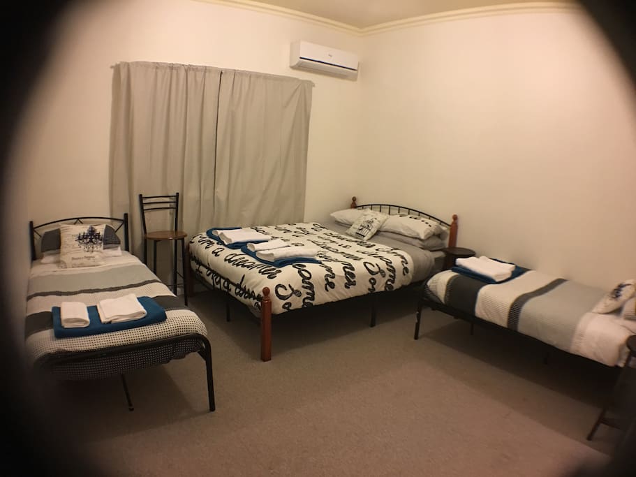 Bedroom 1 (1 Queen and 2 single beds)