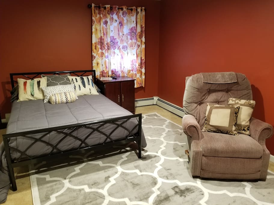 Full size bed can fit 2 people, Comfy recliner so you can put up your feet and watch TV.