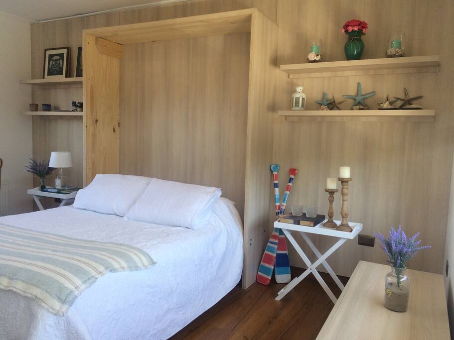 Cozy bedroom with the coastal decor
