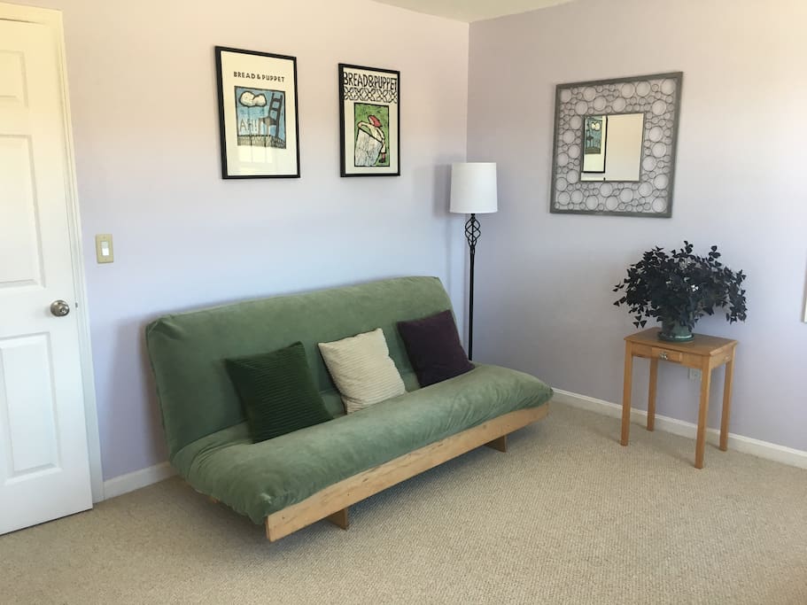 Adjacent sitting room (or second bedroom) w/ futon couch, 42" smart TV, workspace, mini-fridge, coffee maker, microwave