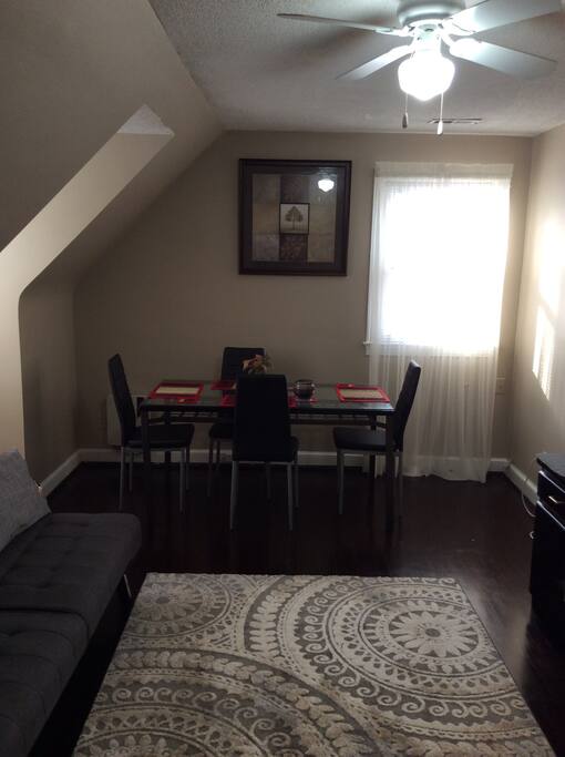 Living Room/Dining Room Area with Wall Heater,