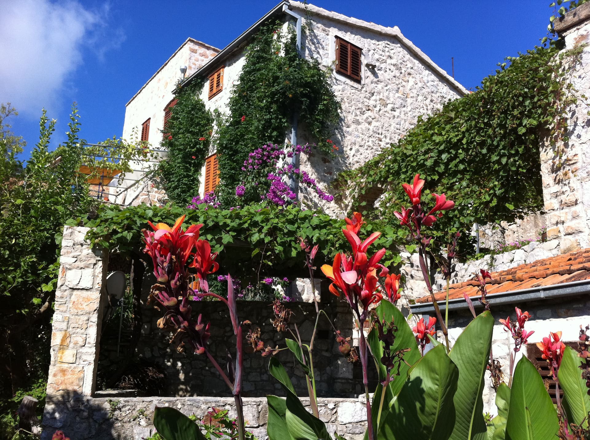 Stone house with terrace, garden and sea view