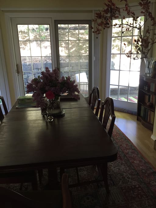 Formal dining room with French doors onto back patio