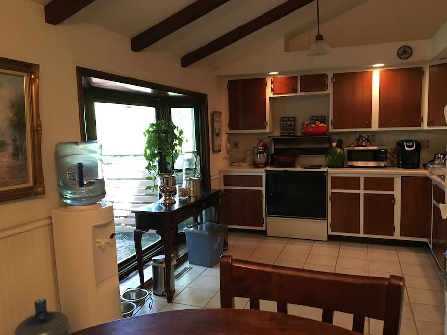 Full kitchen with Electric Range, dishwasher, and full fridge with all the necessities for cooking (We do a fair amount of cooking so we have pretty much anything you are looking for)