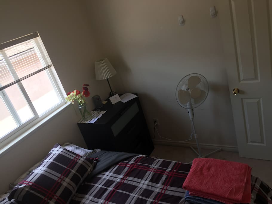 Includes a roomy dresser and a fan for those warm summer days