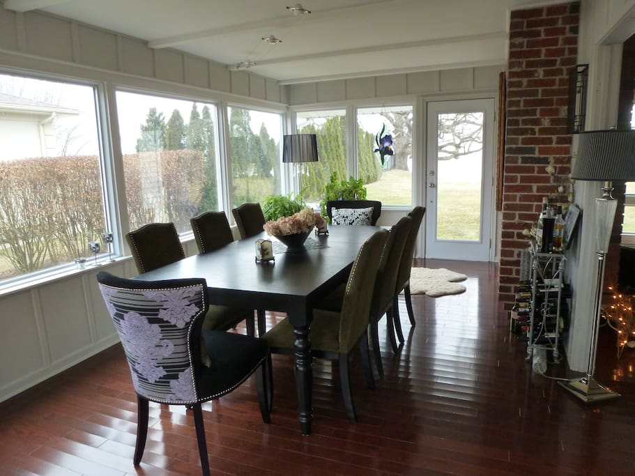 Open concept dining room lots of windows and lake view