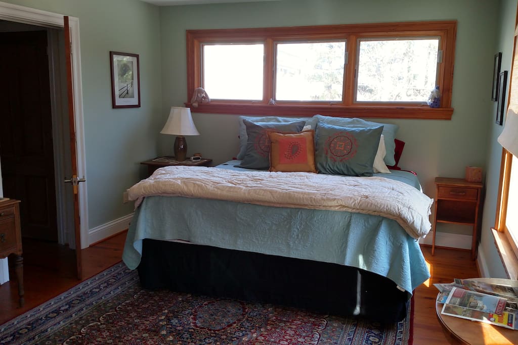 Halcyon Green room with a king bed.