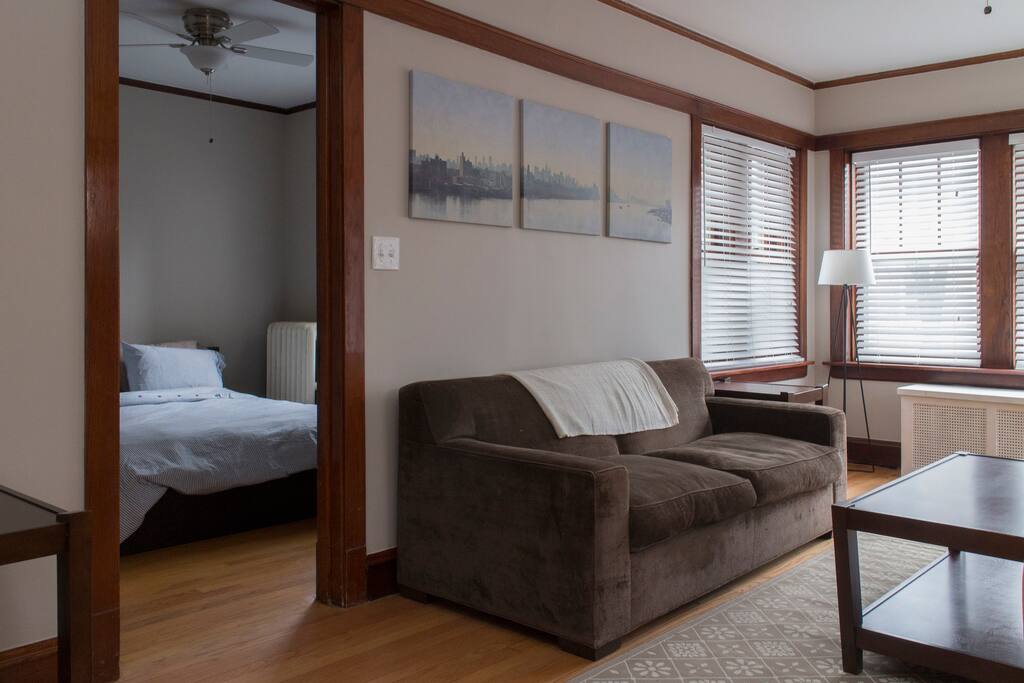 Sneak peek of bedroom number one from the living room
