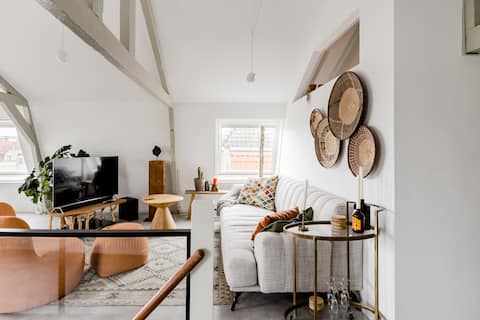 Overlook the City Under the Beams at a Bohemian Loft