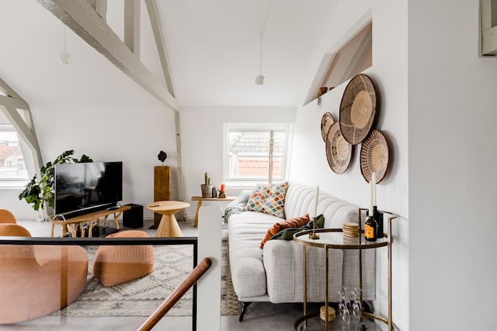 Overlook the City Under the Beams at a Bohemian Loft