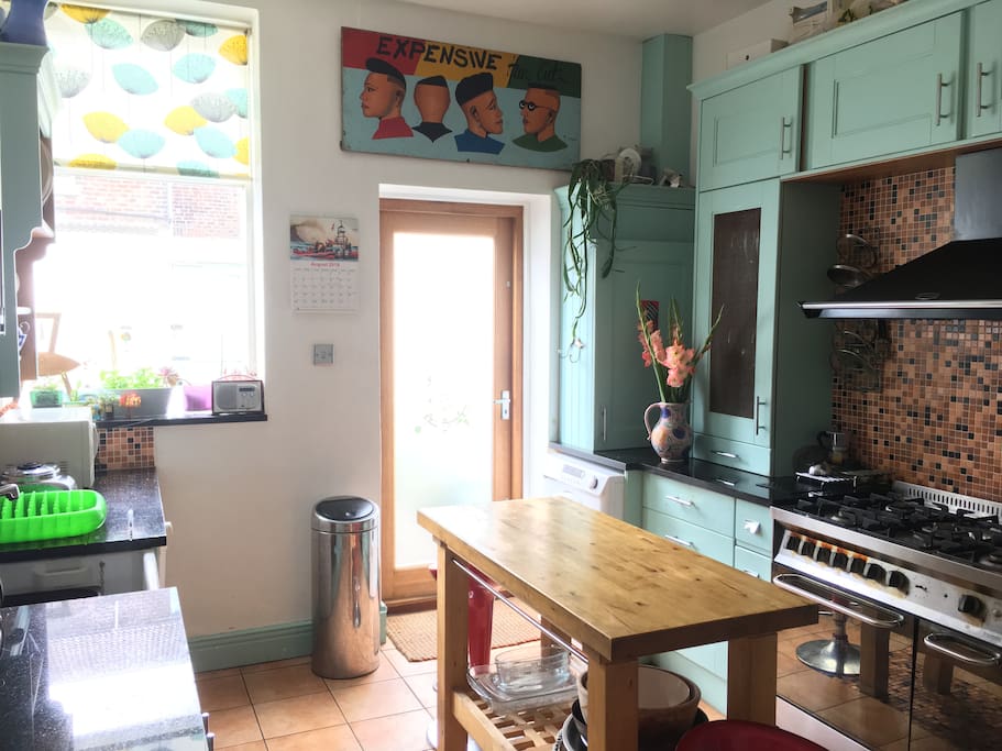 Kitchen with cooker, washing m/c, fridge-freezer, dishwasher & microwave