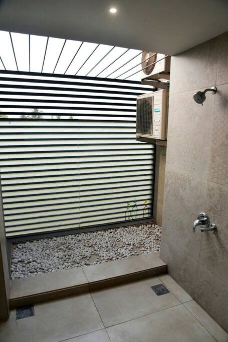 Open Bathroom with rain shower