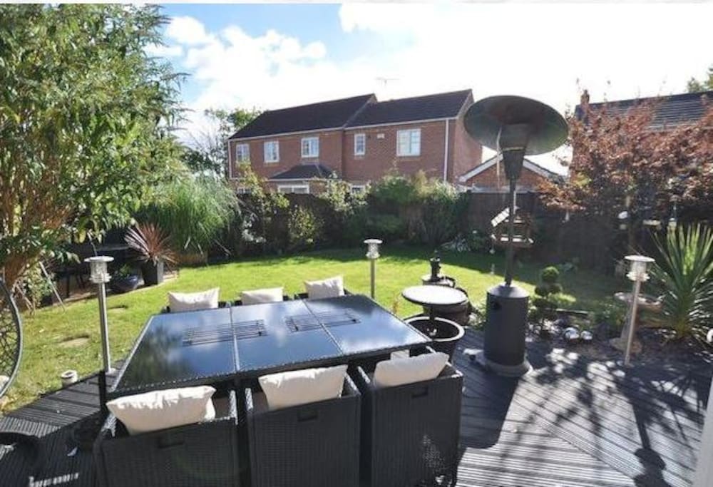 The Garden with Rattan Furniture and BBQ is for you to enjoy.