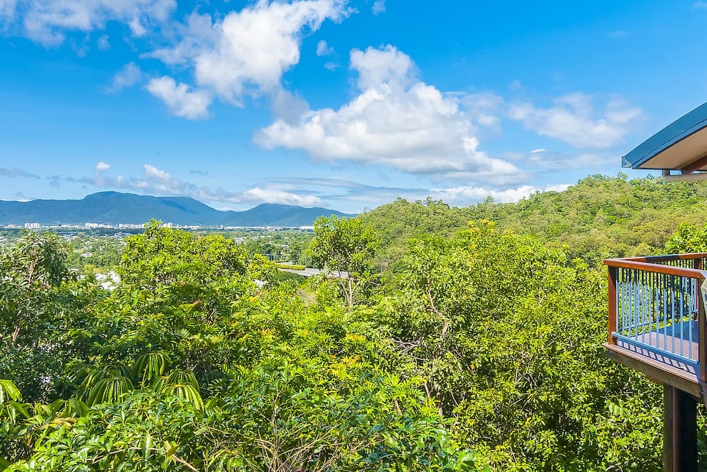 Enjoy views of the city and surrounding mountains in our tropical hideaway nestled on the hillside