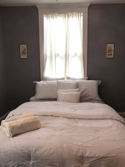 ..and to your left will be a queen bed with comfy bedding! A private suite downstairs.