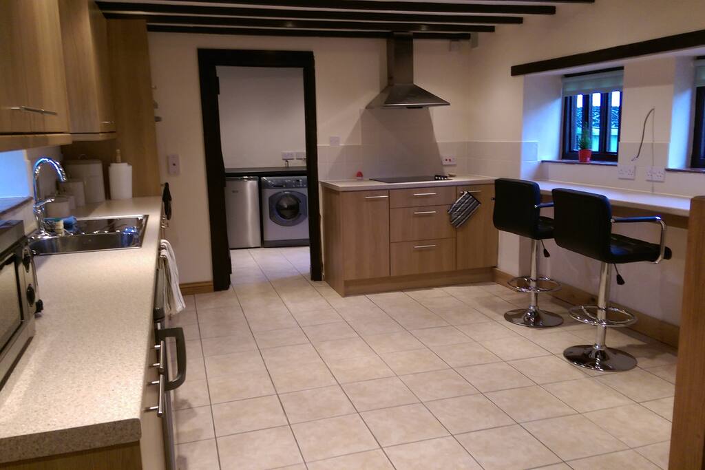 Modern kitchen with breakfast bar.