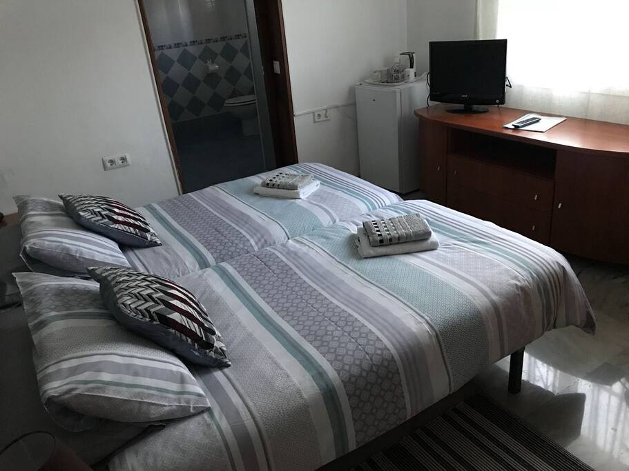 TV, tea and coffee making facilities, fridge, work space and more storage