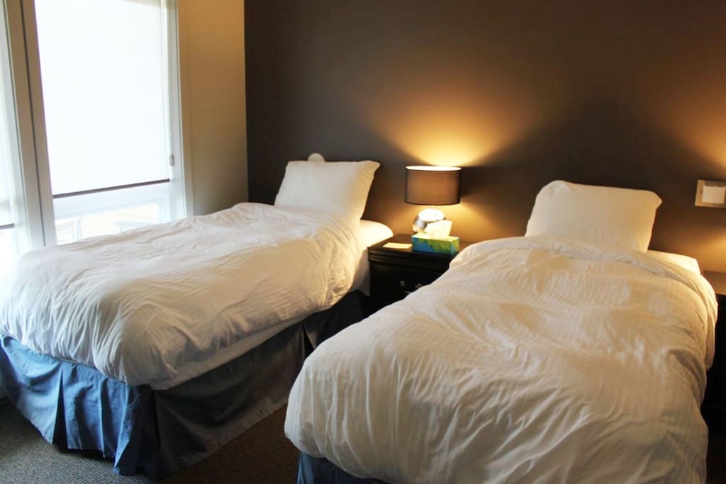 Bedding configurations in the second bedroom can vary
