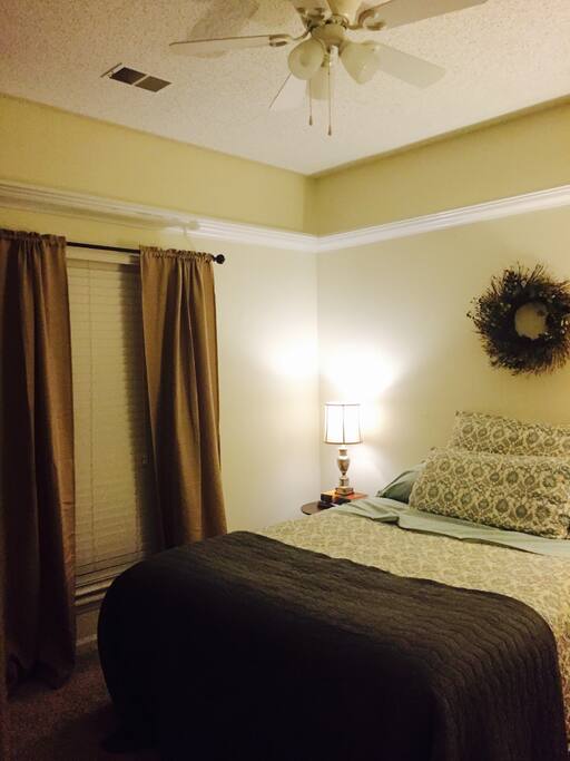 This quiet bedroom awaits you.