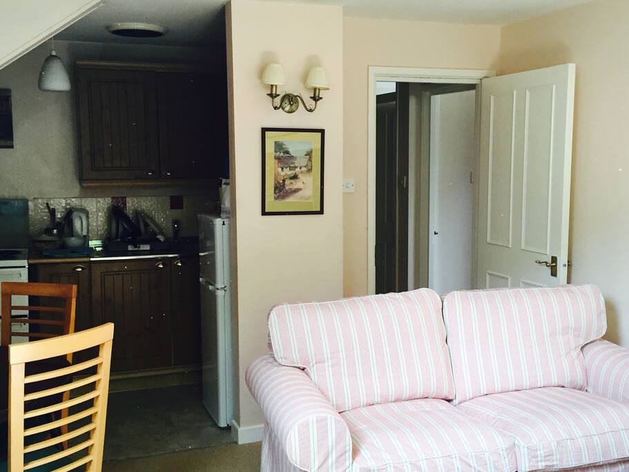 Sitting room leads into Kicthen
