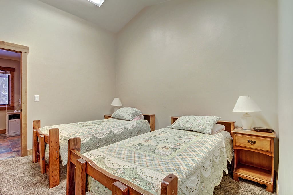 Kids room with two twins connects directly with master bedroom.