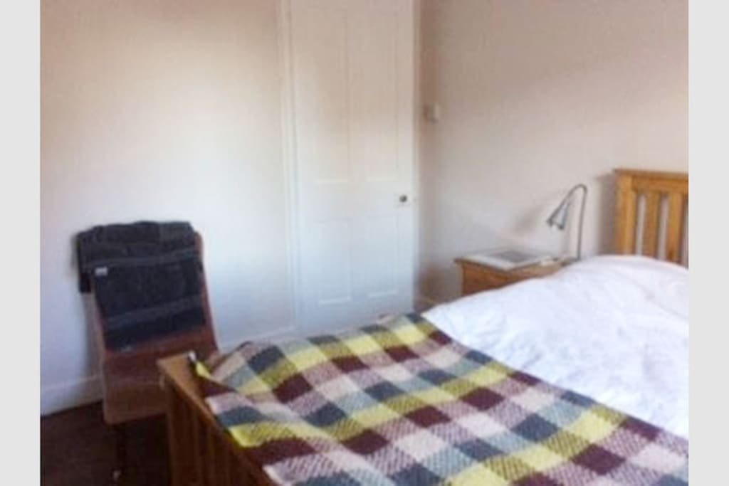 Double bed - good mattress with topper, feather duvet, pillows. Cotton linen.